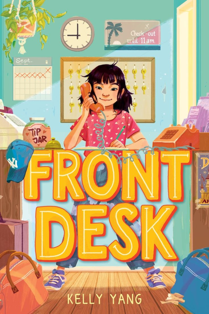 Illustration of a young girl at a front desk holding a telephone, in a colorful setting with a clock, calendar, and key hooks in the background. The title 'FRONT DESK' by Kelly Yang is prominently displayed.